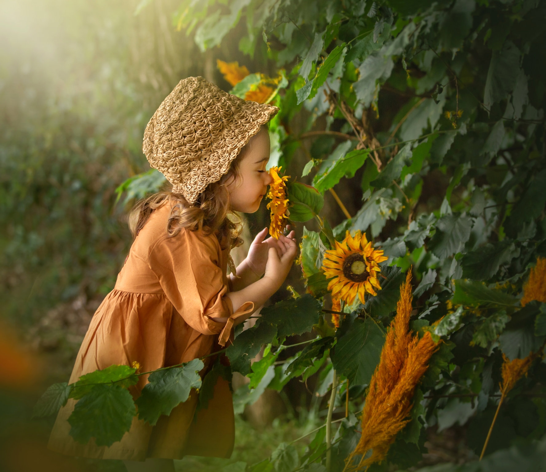 Sesión exterior en Getxo con niña pequeña vestida de estilo vintage
